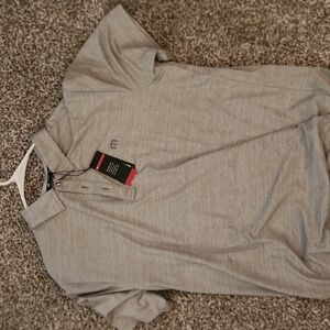 Brand new Travis Mathew Heater Polo